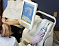 Orthodontist Using Ormco Lythos System to Create Mold of Teeth