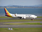 Air Pacific 737-800 with reverse thrust still deployed, Auckland International Airport