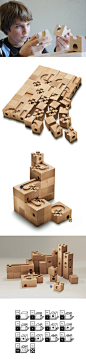 [木器欣赏] 瑞士木玩cuboro standard将小朋友最喜欢的两种游戏弹珠和积木结合起来，每个木块5cm见方，内部设置不同的弹珠轨道，除了可以搭建通常的结构，还能形成大型轨道系统，对小朋友和大人来说都是很有挑战性的游戏