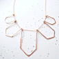 5 geometric silhouette necklace