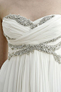 Love the detailing on this empire-waist gown