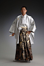 Men’s contemporary ceremonial dress, with kimono, haori and hakama.  Japan