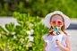 Adorable little girl with lollipop on tropical beach by Dmitry Travnikov on 500px