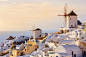 Oia in sunset rays at Santorini, Greece