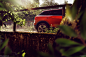 Audi Q2 coral orange : Audi Q2 with coral orange paintjob offroad and urban