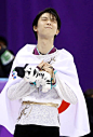 Yuzuru Hanyu of Japan celebrates after winning the men's figure skating gold medal at the Pyeongchang Winter Olympics in Gangneung South Korea on Feb...