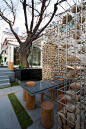 Closeup of the gabion walls at Cafe Ato in Seoul. The "falling" rocks are suspended by wires and eyebolts.