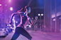 Caucasian woman running on city street