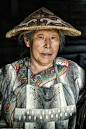 Pictured is an Orochi woman from the Vaninsky District of Khabarovsk Krai, Siberia, in traditional fish-skin clothing. The Orochi people never had a written language, but now their spoken tongue is on the verge of extinction