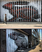 【超酷兔子涂鸦】街头艺术家Roa在英国伦敦的街道上的一幅新作品，利用独特的棱状墙面作画一只兔子，在不同的角度看会有不同的图案。在正面看会有一点奇怪，毛茸茸的东西，从侧面就能看出来是2只兔子超酷。