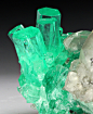 fuckyeahmineralogy:

Beryl var. Emerald with Calcite; Boyaca Department, Colombia