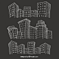 Sketchy city buildings on blackboard Free Vector