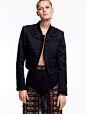Toni models a cropped jacket with cut-out embellished skirt