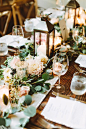 centerpiece with lanterns - photo by Pat Furey http://ruffledblog.com/upstate-new-york-wedding-at-bedford-post-inn: 