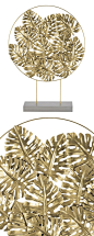 Display your gold "metal" with pride. This modern sculpture combines the earthy look of foliage with a sophisticated gold finish. Its circular pendant features leafy cut-outs and is mounted on top of a...  Find the Leaves of Gold Display, as see