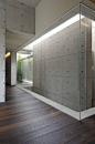 Concrete House by A-cero reinforces my love for textured grey, lighting and the life-force of wooden floors