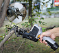 Tacklife Compact Cordless Reicprocating Saw with Branch Jaws Cutting in Action