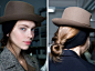 London A/W 2011 Fashion Week: Grooming trends
Backstage at Margaret Howell, Sam Bryant and the makeup team used MAC to off-set powdery english-rose complexions with complementary pink shades. Hairstylist Neil Moodie tied hair into loose low chignons, then