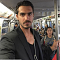 dusan susnjar riding the subway in style. tone on tone dressing. men's fashion and style.