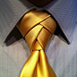 Here is a detailed tutorial on how to tie the exotic and attention-grabbing Eldredge necktie knot.