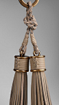 Burberry: Vintage-finish metal key charm with leather tassels: 