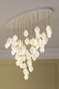 One of the products in Haberdashery's luxury lighting range inspired by the first blooms of spring. Each stylised bud is lit from within creating a soft glow through translucent porcelain petals. The buds are accented in gold with plated fixings and fine 