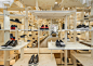 Kengo Kuma adds timber grid to Milan Camper store : Japanese architect Kengo Kuma has covered the interior of Camper’s Milan store in a grid of pale ply that stretches from floor to ceiling.