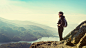 andreaobzerova在 500px 上的照片Female hiker on top of the mountain enjoying valley view, Ben A&#x;27an, Loch Katrina, Highlands, Scotlan