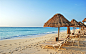 Tropical-sea-beach-chairs-umbrellas_2560x1600