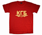苏联主题的纪念 T-Shirt，“КГБ”为苏联克格勃的缩写，配上霸气的鹰形飞翼中带镰刀锤子图案，尽量选择红底黄字，颇有感觉。