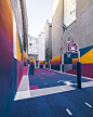 sandwiched between a pair of apartment buildings in paris is the pigalle basketball court – where air balls and alley-oops meet artistic intervention.