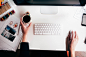 Overhead view of businesswoman typing at desk. by EasyPx on 500px