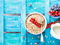 Oats with fresh berries on bright blue textured background by Sofya Bolotina on 500px