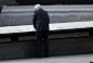 A firefighter makes a rubbing of a victim's name as friends and relatives of the victims of the Sept. 11 terrorist attacks on the World Trade Center gather for a ceremony marking the 11th anniversary of the attacks at the National September 11 Memorial in