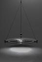 There is a moment when a clinging bead of water, in quiet orb-like suspension, becomes a droplet. 
The droplet reflects its surroundings while gathering light within. 
There is a moment when molten glass transforms from liquid to solid.
 This instant of t