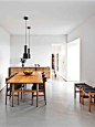 White clean minimalist dining room, love the concrete floor: 