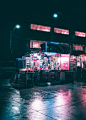 black and gray food stand during nighttime
