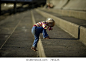 baby climbing up stone steps