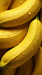 fresh banana seamless background, adorned with glistening raindrops of water. top down view. shot using a dsIr camera, iso 800. professional color grading. soft shadows. clean sharp focus. high - end color correction. food magazine food stylist. award win