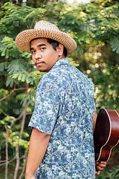 southeast asian ukulele musician