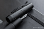 The e-motion, with its dynamic shape and deepest, trendy matte black shade, stirs passion. The e-motion "pure Black" fountain pen has a barrel made of black anodized aluminum with intricate guilloche engraving. It is completely blacked out from 