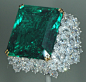 EMERALD EMPIRE / *GREEN ~ This is the Chalk Emerald, a 37.8 carat emerald from Columbia. Columbia is the major source of emeralds. It is nestled in a cluster of 60 pear-shaped diamonds weighing a total of 15 carats. It is housed at the Smithsonian Institu