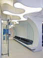 bloo dental- adult waiting area  Forma design- simplicity of the interior leads eye upward to the unique ceiling changes: 