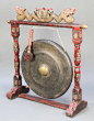 Lot 263, A large circular Chinese gong raised on a pierced and carved hardwood stand complete with beater 42"h x 39"w x 13"d, est £80-120