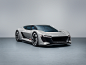 Audi with Robert Grischek : During the prestigious Pebble Beach Automotive week Audi unveiled its PB18 e-tron, a high-performance, all electric concept supercar that focuses on a superior race style driving experience. Lacking any comfort features and aga