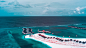 The Maldives Infraland : “Infraland” is a graphic and visual exploration of nature. For this project I've used aerial digital Infrared photography (IR). This technique enables the full sensitivity of the camera’s sensor, making it sensitive to UV, visible