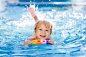 child-learning-to-swim