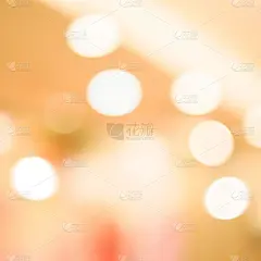 抽象模糊的金色和黄色色彩渐变背景与散景灯光效果为圣诞快乐和新年快乐节日设计和元素概念