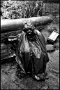 Director Francis Ford Coppola shelters himself from the driving rain that added to the troubles of an already beleaguered shoot for Apocalypse Now, 1979 - Mary Ellen Mark

