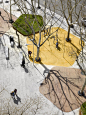 Large granite paving stones alternate with other surfaces in a pentagonal geometric pattern, a part of an integrated urban design and landscape concept that will link the Plaza Santa Bárbara with the neighbouring streets around the future mixed use buildi